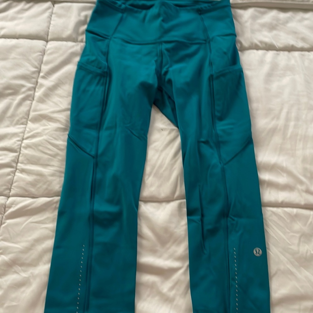 Lululemon Fast and Free capris. Beautiful turquoise color! Like new!